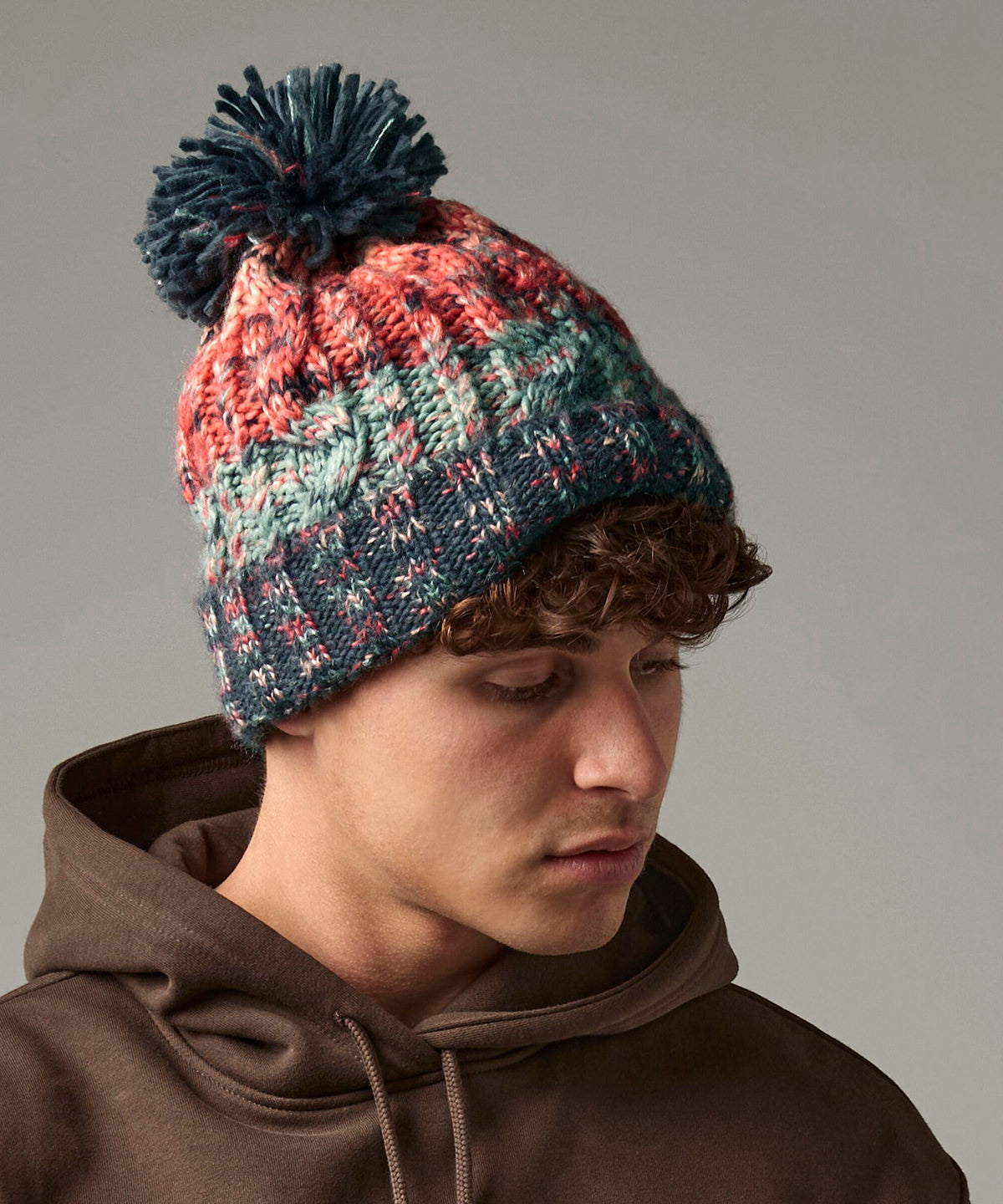 Corkscrew pom pom beanie